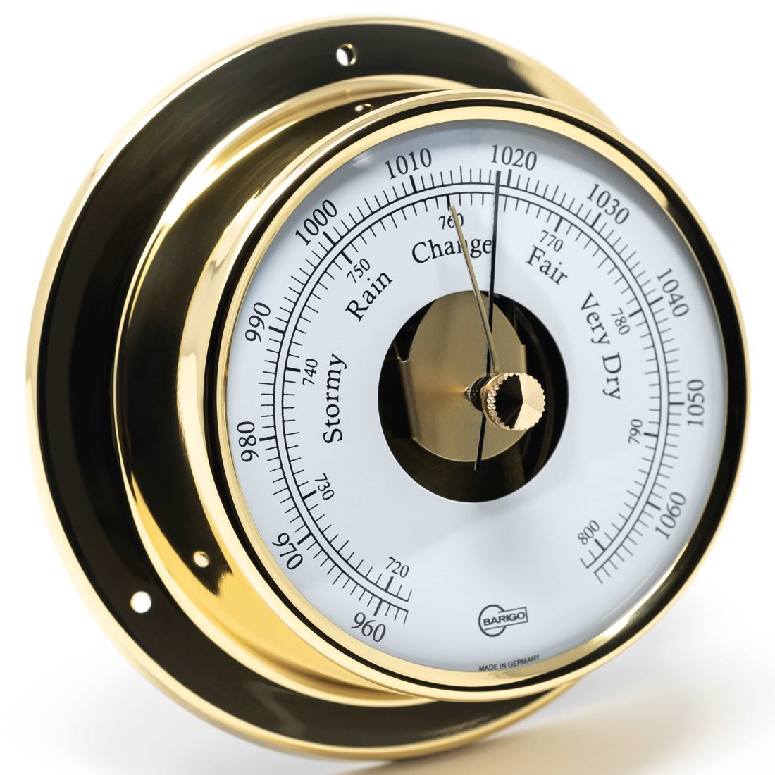 German made brass barometer with analog dial showing weather and air pressure readings