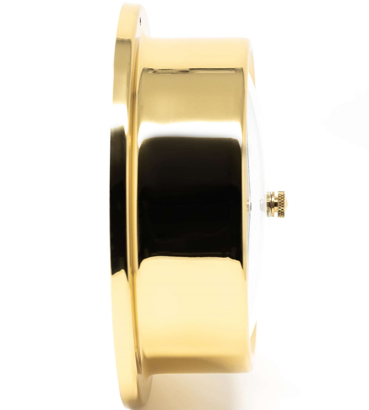 Side view of a polished brass wall barometer or clock with glass face, nautical style