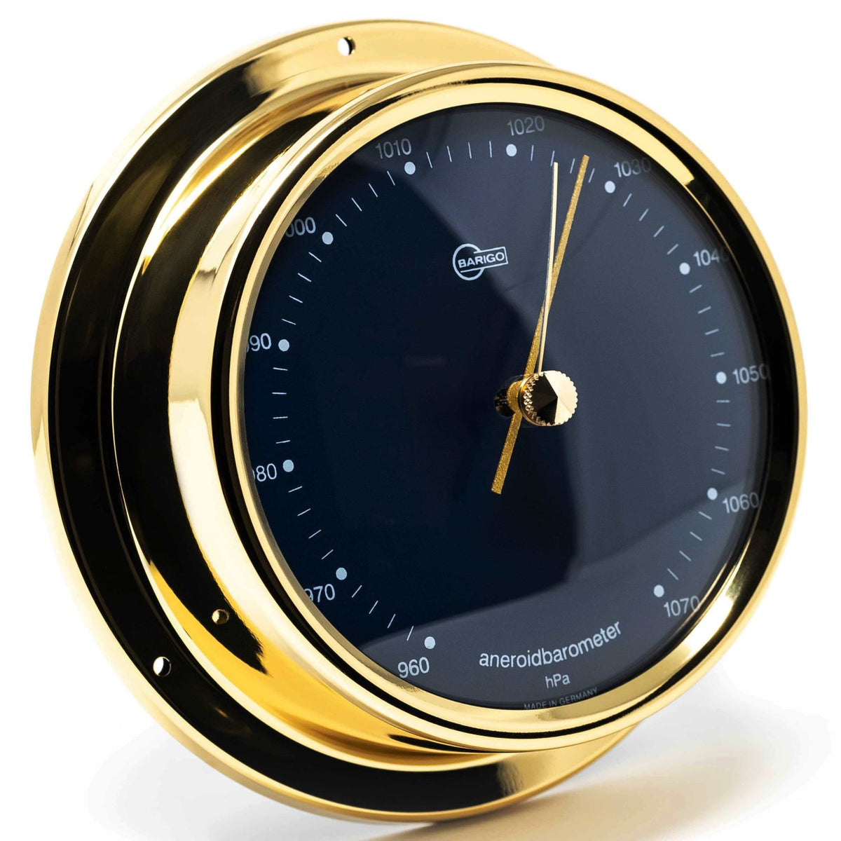 Gold-framed German aneroid barometer with black dial and precise weather markings