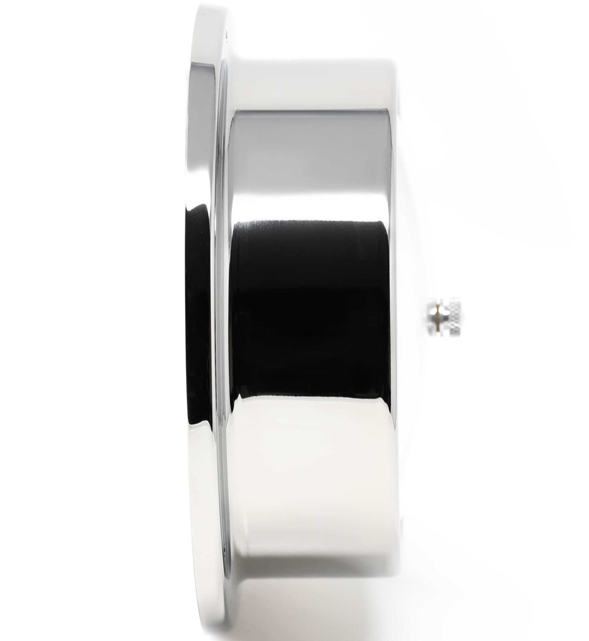 Side view of polished metal barometer or clock case, nautical weather instrument