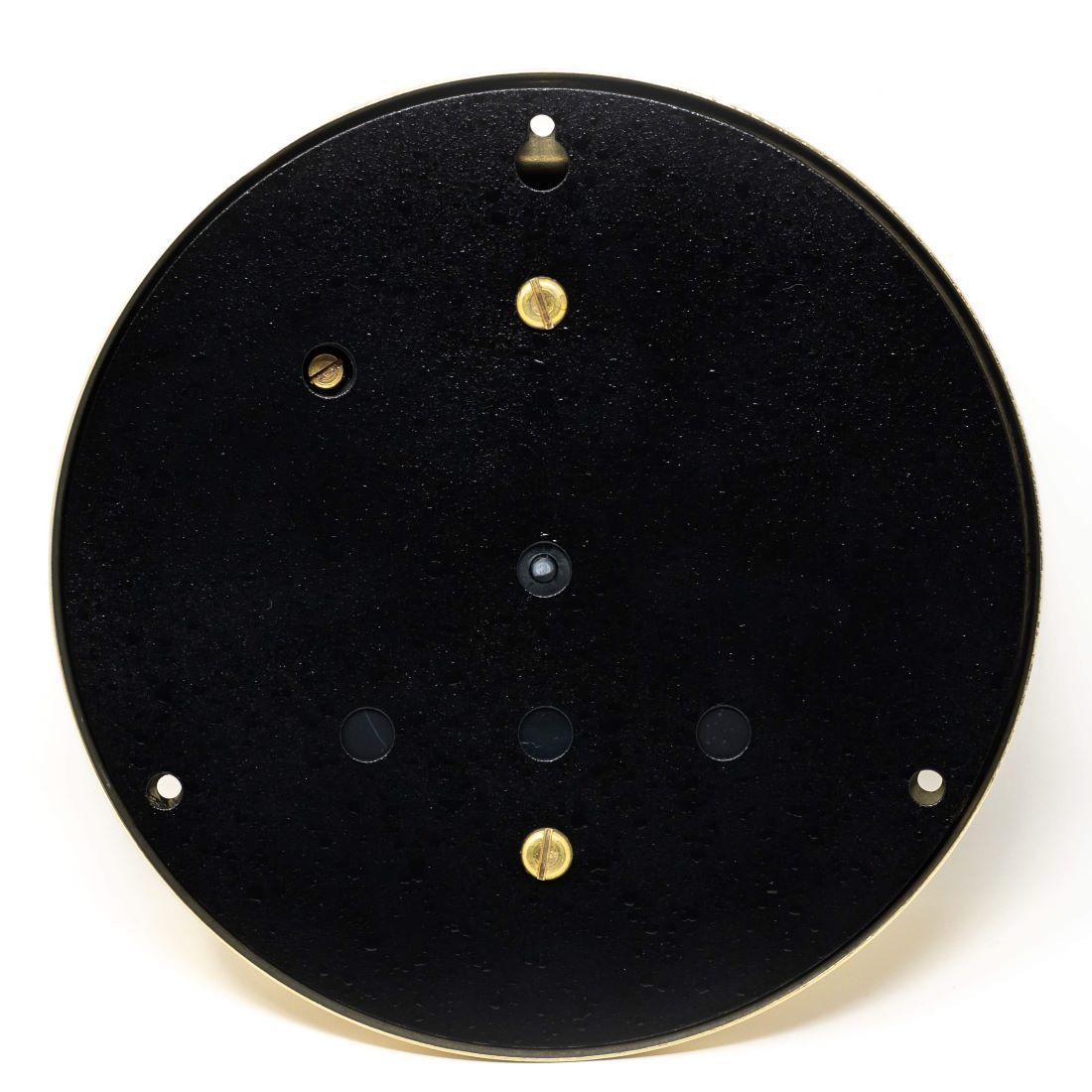 Back view of round barometer or wall clock mounting plate with screws