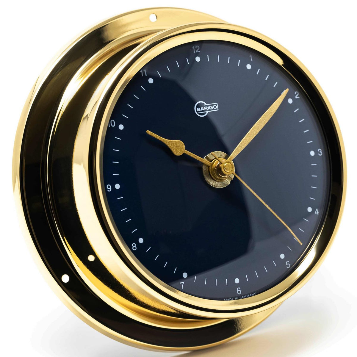 German-made brass nautical wall clock with black dial and gold accents, weather instrument
