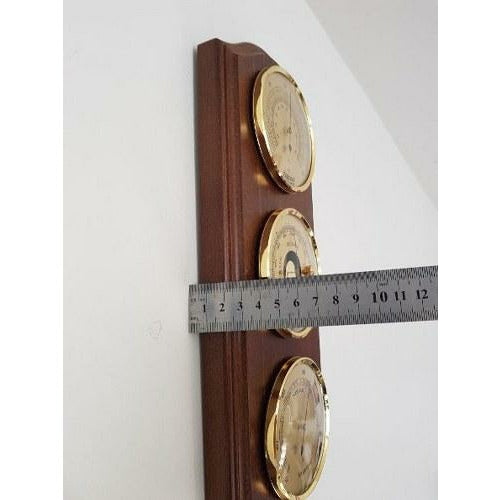 Wooden weather station with barometer, hygrometer, and thermometer, measured with ruler