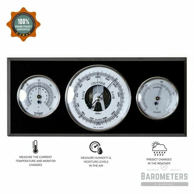 Modern black and chrome wooden weather station with barometer, thermometer, hygrometer.
