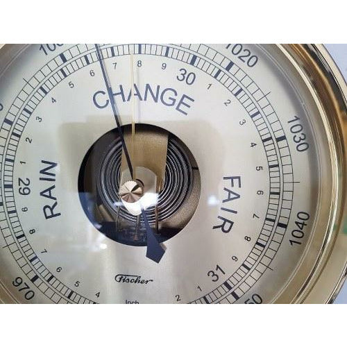 Gold dial on large barometer